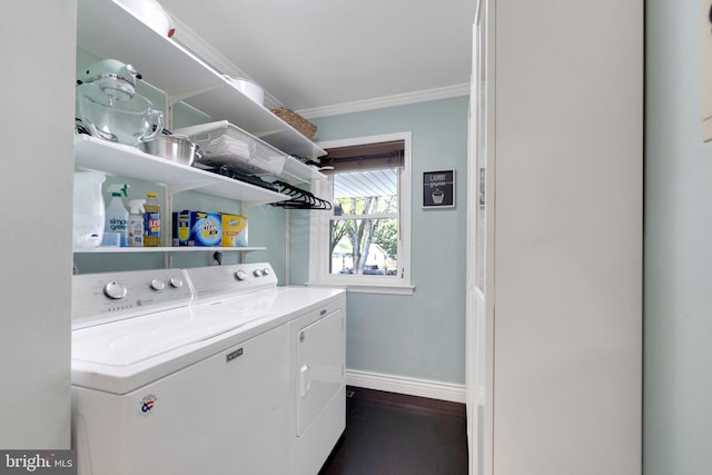 1995 Pierce Dr, Whitehall, PA 18052 - laundry area with washing machine and clothes dryer, baseboards, ornamental molding, and dark wood-style flooring