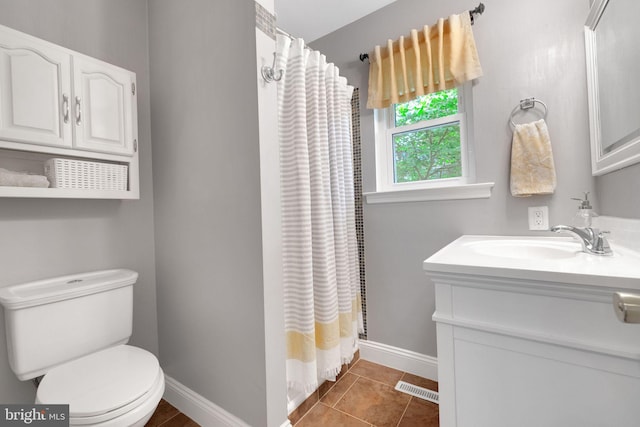1995 Pierce Dr, Whitehall, PA 18052 - bathroom featuring vanity, baseboards, toilet, curtained shower, and tile patterned floors