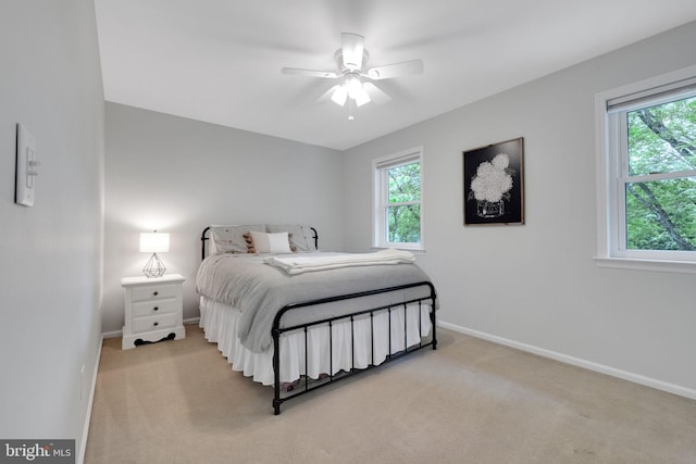 1995 Pierce Dr, Whitehall, PA 18052 - bedroom featuring light carpet, baseboards, and multiple windows