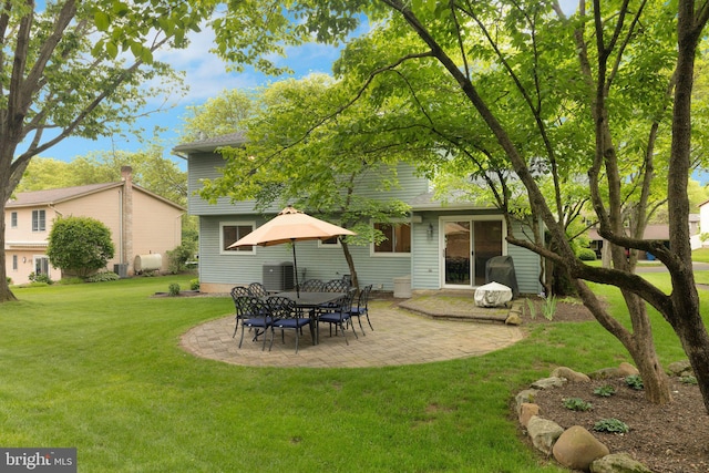 1995 Pierce Dr, Whitehall, PA 18052 - rear view of house with a patio area and a yard