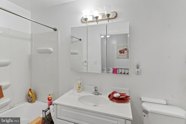 2227 Carter St, Wilmington, DE 19802 - bathroom featuring toilet, vanity, and washtub / shower combination
