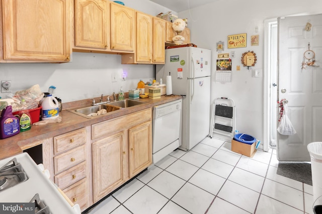 2227 Carter St, Wilmington, DE 19802 - kitchen with white appliances, a sink, light brown cabinetry, light tile patterned floors, and light countertops
