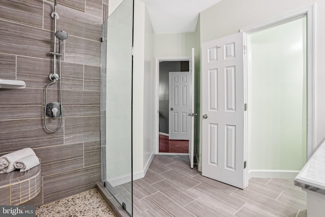 4691 Longstreet Ln Unit 202, Alexandria, VA 22311 - full bathroom with a shower stall and baseboards