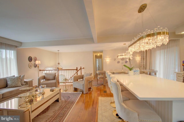 3405 Sundown Farms Way, Olney, MD 20832 - living room with a chandelier, light wood-style flooring, and beamed ceiling