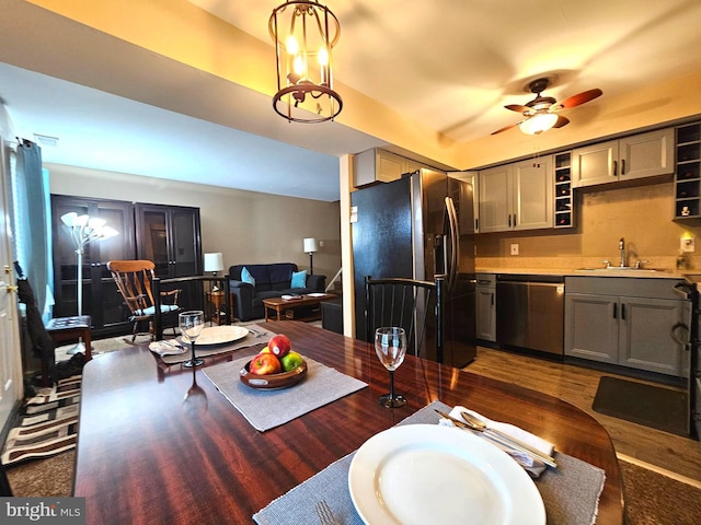 5200 Hilltop Dr Unit Bb-17, Brookhaven, PA 19015 - kitchen featuring stainless steel dishwasher, refrigerator with ice dispenser, light countertops, a ceiling fan, and wood finished floors