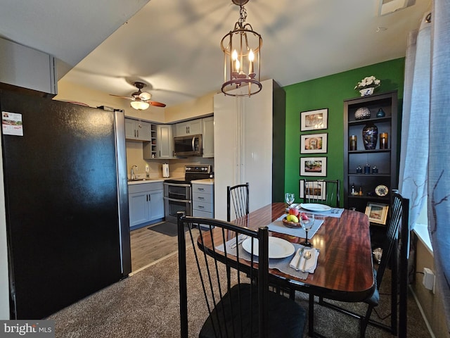 5200 Hilltop Dr Unit Bb-17, Brookhaven, PA 19015 - carpeted dining area featuring a sink and ceiling fan