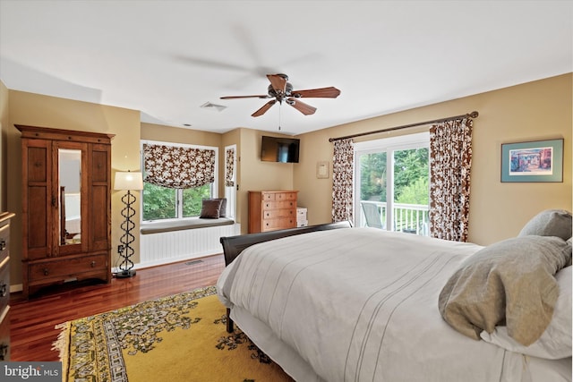 114 W Pembrey Dr, Wilmington, DE 19803 - bedroom featuring dark wood-style floors, access to exterior, and ceiling fan