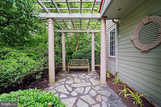 114 W Pembrey Dr, Wilmington, DE 19803 - view of patio featuring a pergola