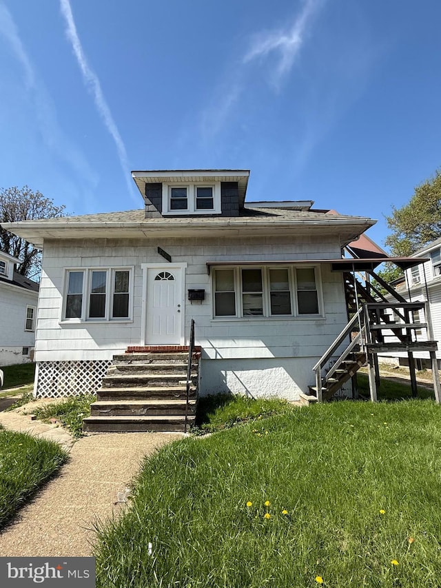 2905 Echodale Ave, Baltimore, MD 21214 - bungalow-style house with stairs, entry steps, and a front lawn