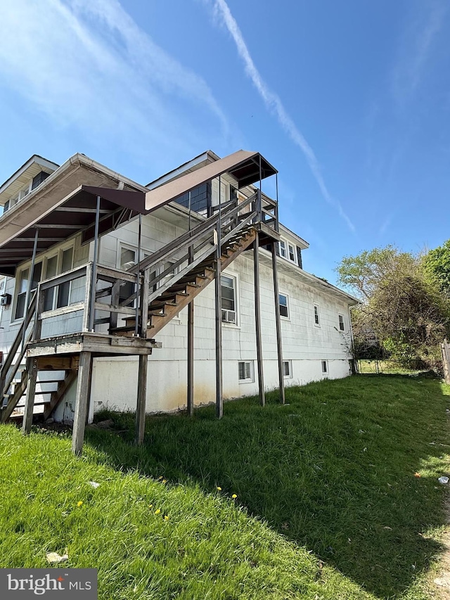 2905 Echodale Ave, Baltimore, MD 21214 - view of side of home featuring stairway and a yard