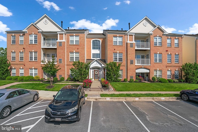 5458 Glenthorne Ct Unit 5458, Baltimore, MD 21237 - view of property featuring uncovered parking