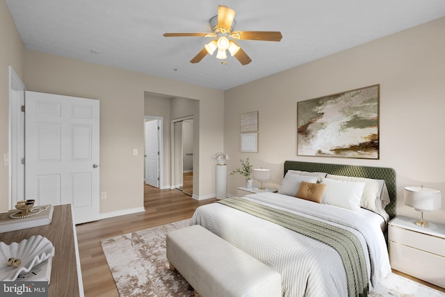 5458 Glenthorne Ct Unit 5458, Baltimore, MD 21237 - bedroom featuring wood finished floors, baseboards, ceiling fan, and a closet