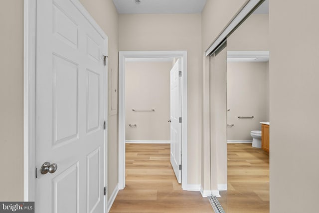 5458 Glenthorne Ct Unit 5458, Baltimore, MD 21237 - hall with light wood finished floors and baseboards