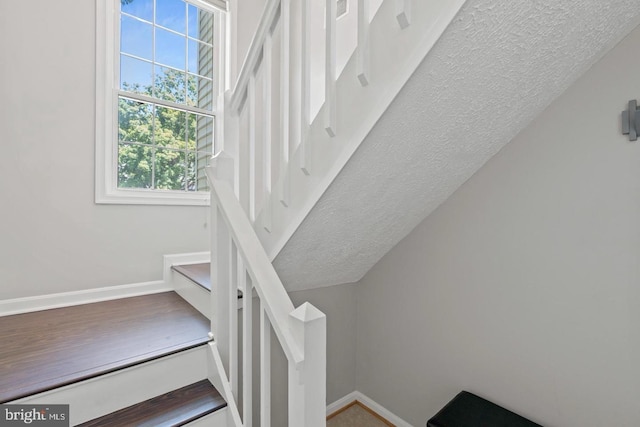 10161 Oakton Terrace Rd, Oakton, VA 22124 - stairway featuring baseboards and a textured ceiling