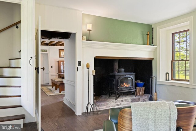 408 Kintner Hill Rd, Upper Black Eddy, PA 18972 - living area featuring stairway, dark wood-style floors, and a wood stove