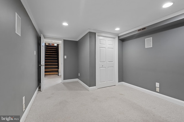 3006 Dillon St, Baltimore, MD 21224 - finished below grade area with light carpet, baseboards, recessed lighting, and ornamental molding