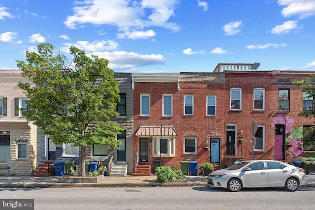 3006 Dillon St, Baltimore, MD 21224 - view of property featuring brick siding and entry steps