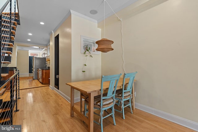 3006 Dillon St, Baltimore, MD 21224 - dining room with baseboards, ornamental molding, light wood-type flooring, and recessed lighting