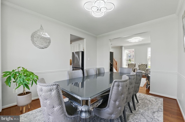19102 Black Maple Way, Hagerstown, MD 21742 - dining space with ornamental molding, wood finished floors, and baseboards