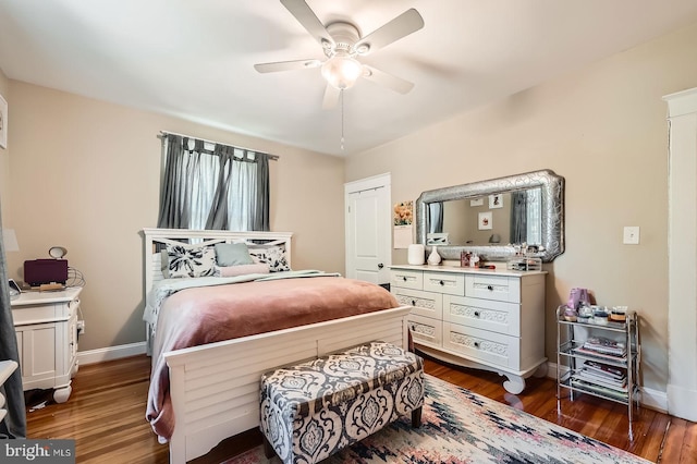 3203 Beverly Rd, Baltimore, MD 21214 - bedroom featuring dark wood-style floors, baseboards, and ceiling fan