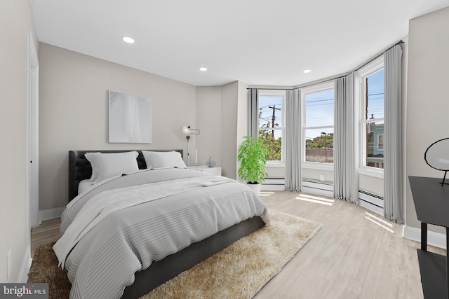 2223 W Indiana Ave, Philadelphia, PA 19132 - bedroom with multiple windows, wood finished floors, baseboards, and recessed lighting