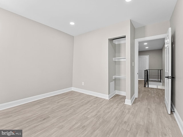 2223 W Indiana Ave, Philadelphia, PA 19132 - unfurnished bedroom featuring light wood-type flooring, baseboards, and recessed lighting