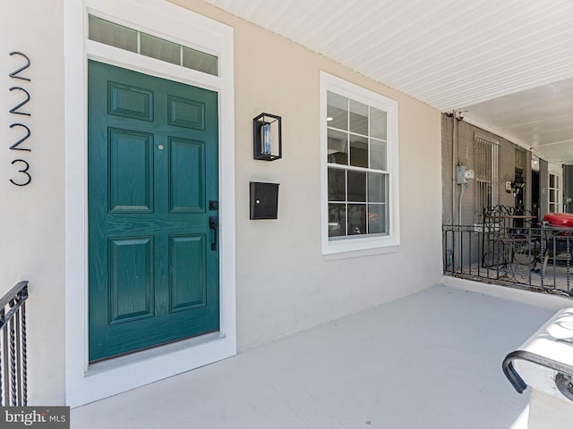 2223 W Indiana Ave, Philadelphia, PA 19132 - property entrance with stucco siding and a porch