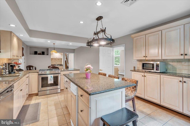 1 Birchall Dr, Haddonfield, NJ 08033 - kitchen featuring stainless steel appliances, decorative backsplash, recessed lighting, light tile patterned floors, and a peninsula