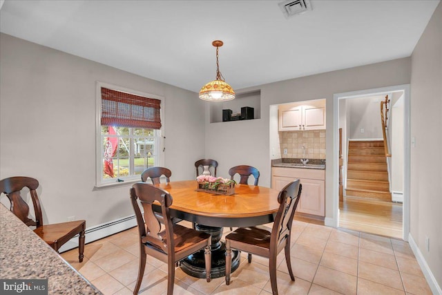 1 Birchall Dr, Haddonfield, NJ 08033 - dining room with light tile patterned floors, stairway, baseboards, and baseboard heating