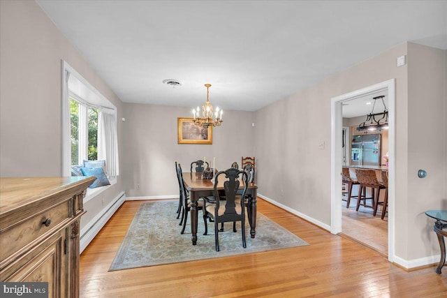 1 Birchall Dr, Haddonfield, NJ 08033 - dining area with baseboard heating, light wood-style floors, a chandelier, and baseboards