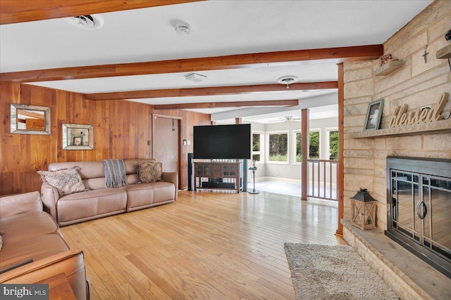 1 Birchall Dr, Haddonfield, NJ 08033 - living room featuring a fireplace, a ceiling fan, beamed ceiling, hardwood / wood-style flooring, and wood walls