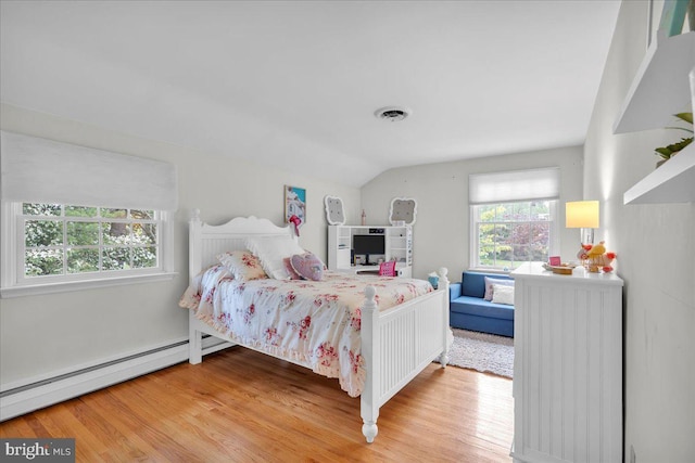 1 Birchall Dr, Haddonfield, NJ 08033 - bedroom with light wood finished floors, a baseboard radiator, and vaulted ceiling