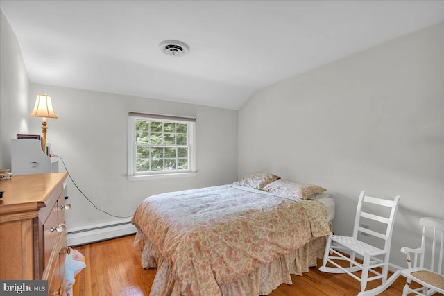 1 Birchall Dr, Haddonfield, NJ 08033 - bedroom featuring baseboard heating, wood finished floors, and vaulted ceiling