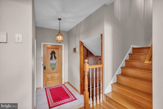 1 Birchall Dr, Haddonfield, NJ 08033 - tiled entrance foyer with a chandelier, stairs, and baseboards