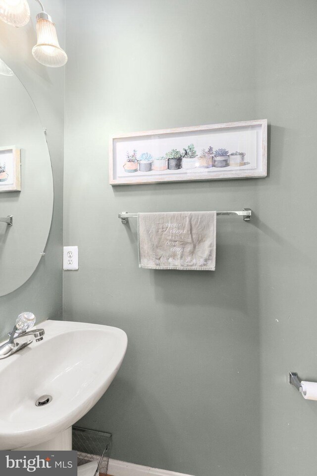 714 Kirkcaldy Way, Abingdon, MD 21009 - bathroom with a sink and baseboards