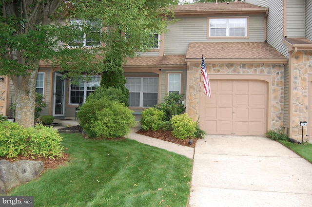 36 Kettlebrook Dr, Mount Laurel, NJ 08054 - multi unit property with driveway, stone siding, roof with shingles, an attached garage, and a front lawn