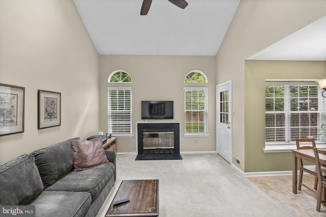 36 Kettlebrook Dr, Mount Laurel, NJ 08054 - living area with ceiling fan, a fireplace with flush hearth, baseboards, high vaulted ceiling, and carpet flooring
