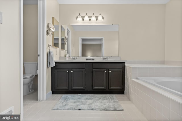 36 Kettlebrook Dr, Mount Laurel, NJ 08054 - full bathroom featuring toilet, double vanity, tile patterned flooring, and a relaxing tiled tub