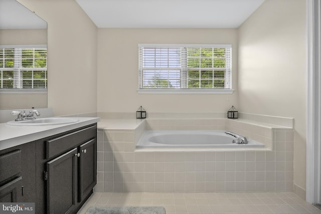 36 Kettlebrook Dr, Mount Laurel, NJ 08054 - bathroom featuring a garden tub, vanity, plenty of natural light, and tile patterned floors
