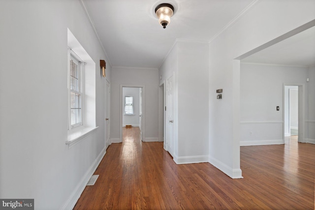 6901 Park Heights Ave, Baltimore, MD 21215 - corridor with wood finished floors, baseboards, and ornamental molding