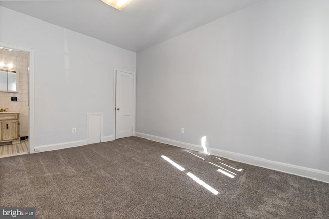 6901 Park Heights Ave, Baltimore, MD 21215 - unfurnished room with carpet and baseboards