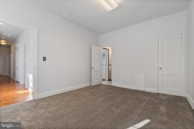 6901 Park Heights Ave, Baltimore, MD 21215 - unfurnished room with carpet floors and baseboards