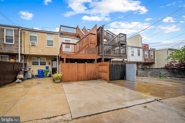 511 S E Ave, Baltimore, MD 21224 - rear view of house with a gate and cooling unit