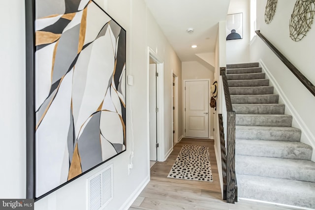 7308 Roxy Run Unit 10, Clinton, MD 20735 - staircase with wood finished floors, recessed lighting, and baseboards