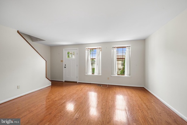 229 Bloomingdale Ave Unit 1, Wayne, PA 19087 - foyer entrance featuring wood finished floors, baseboards, and stairs