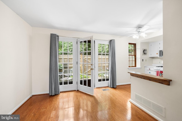 229 Bloomingdale Ave Unit 1, Wayne, PA 19087 - empty room with light wood-style flooring, baseboards, and ceiling fan