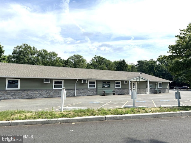 11 Cardinal St Unit D, Manchester, NJ 08759 - ranch-style house featuring uncovered parking and stone siding