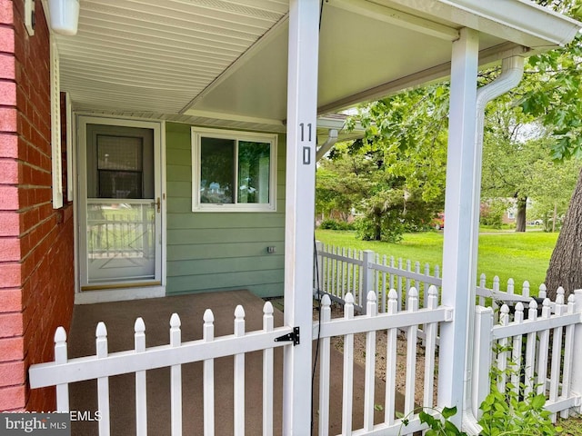 11 Cardinal St Unit D, Manchester, NJ 08759 - view of exterior entry featuring covered porch