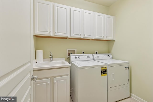 501 Jasmine Cir, Upper Gwynedd, PA 19446 - laundry area featuring cabinet space, washer and clothes dryer, and baseboards