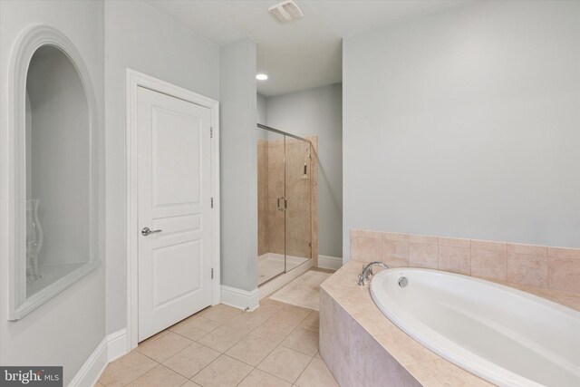 501 Jasmine Cir, Upper Gwynedd, PA 19446 - full bathroom featuring a bath, a shower stall, and tile patterned floors